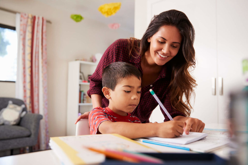 A mother answers her child's question about his homework.