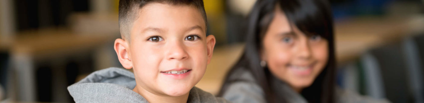 Two students stay focused in class with the help of bite-sized learning.