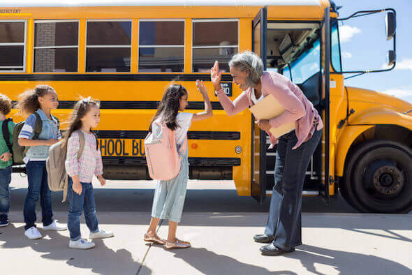 A teacher balances teaching along with other jobs like bus duty while managing to avoid burnout.