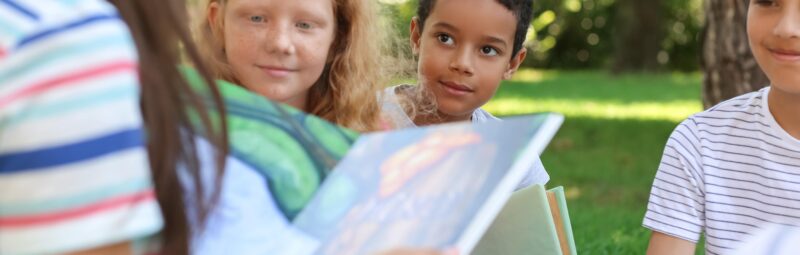 Students reading outside.