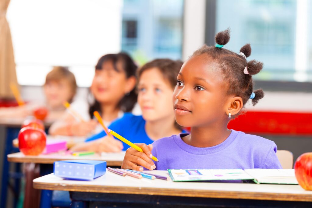 A student listens intently to the lesson in class.