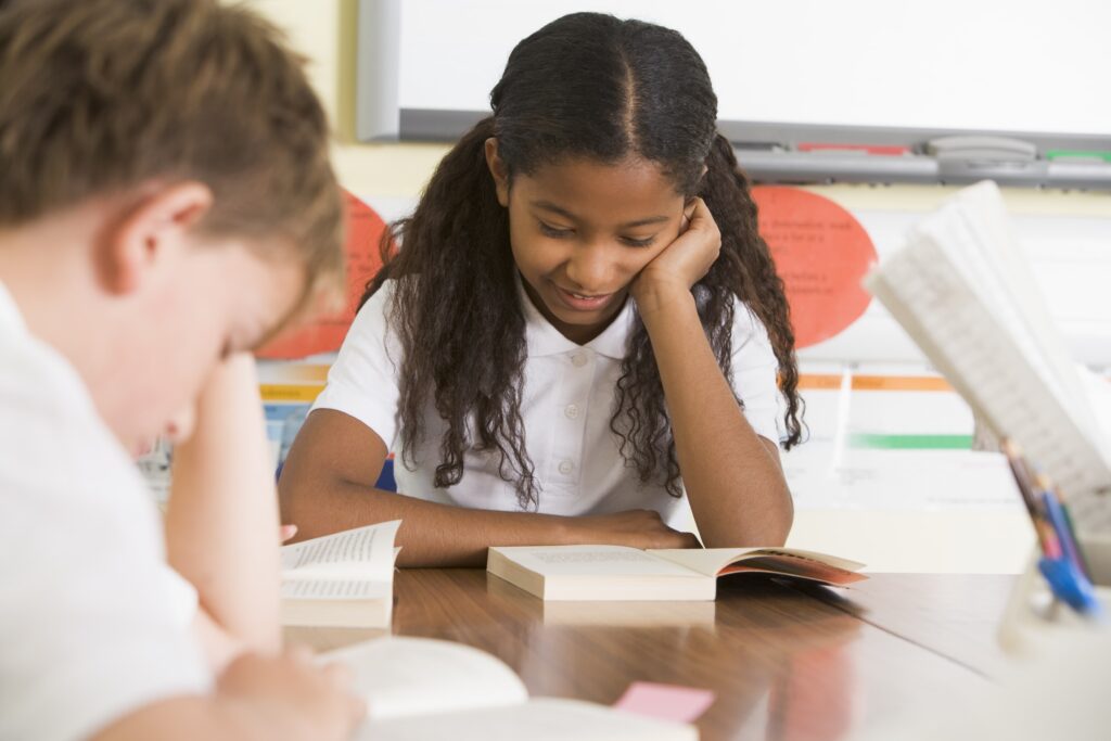 Students silent reading at their desks.