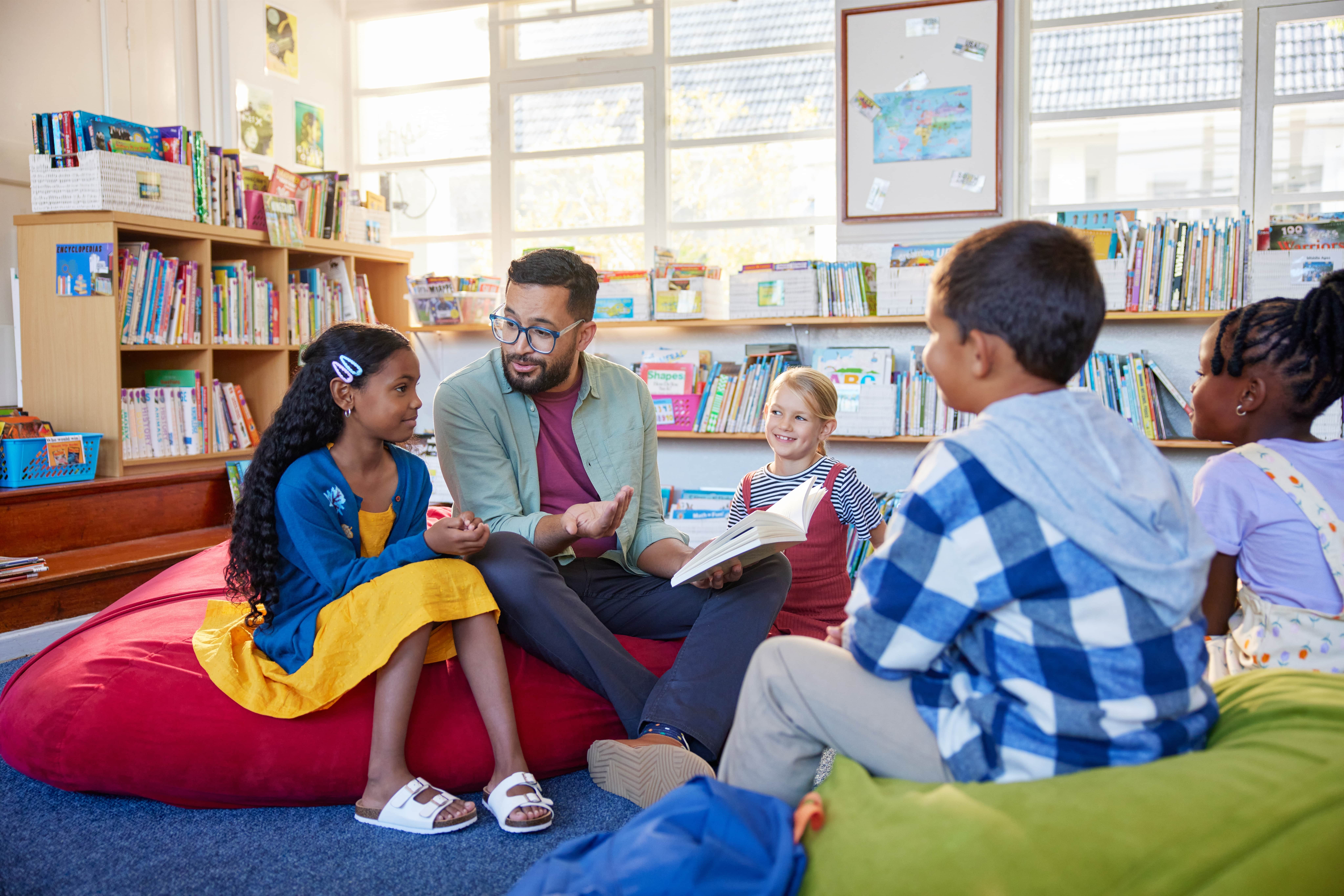 Teacher reading to students.