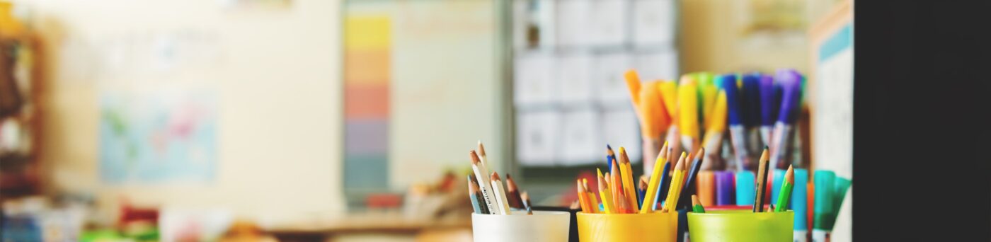 Organized art supplies in an elementary classroom.